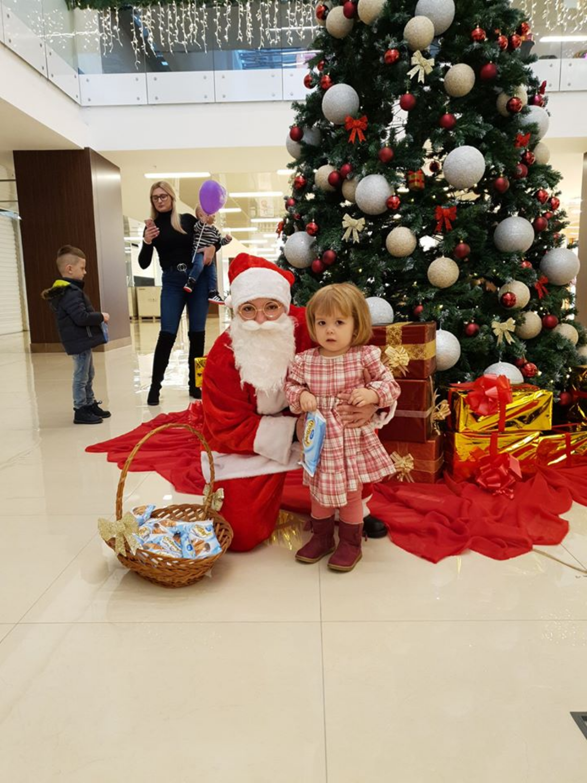 Winter magic - distribution of packages and painting with Santa Claus